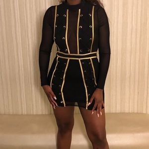 Black and gold mini body con dress